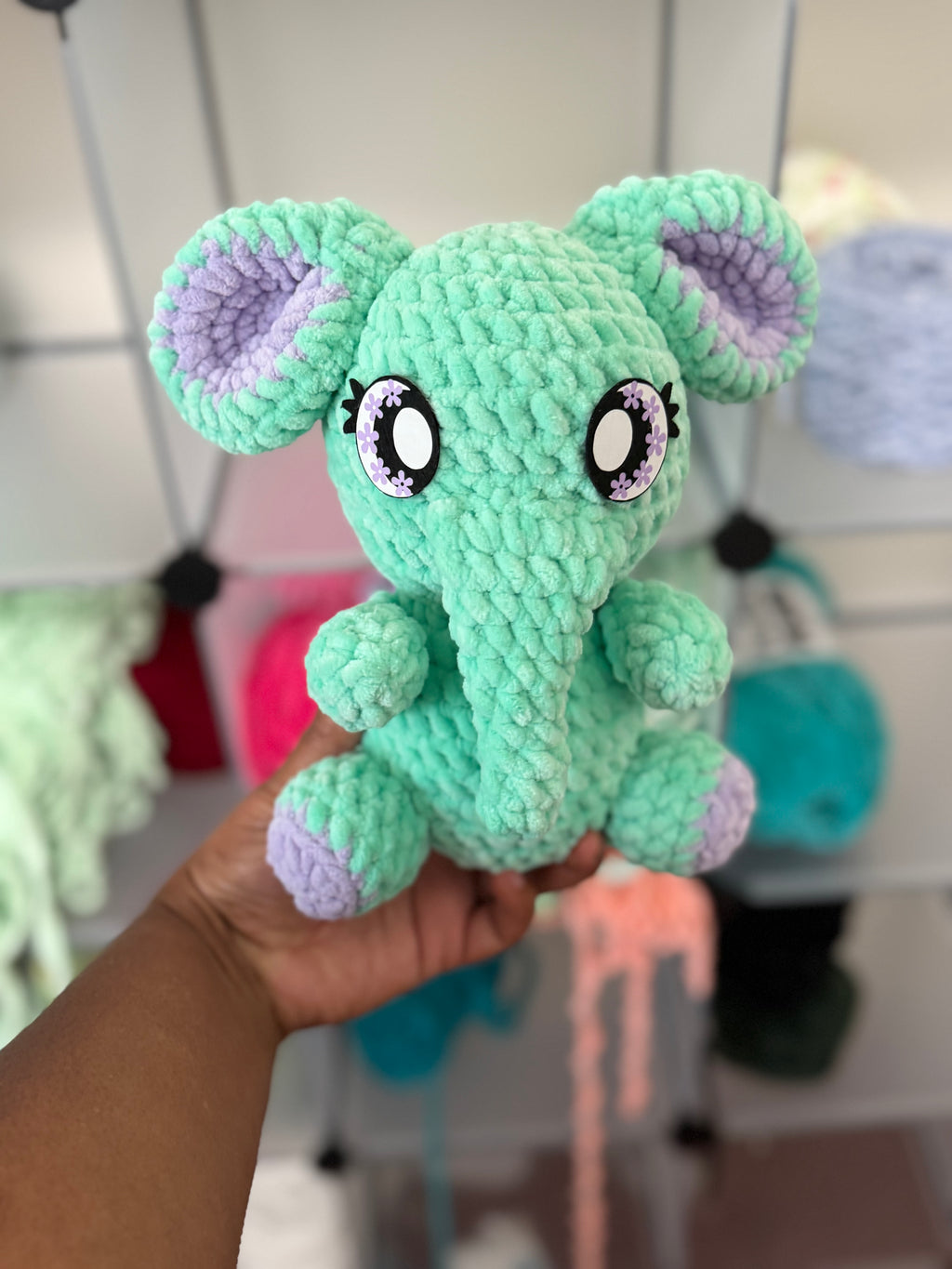 Tiffany and purple sitting elephant