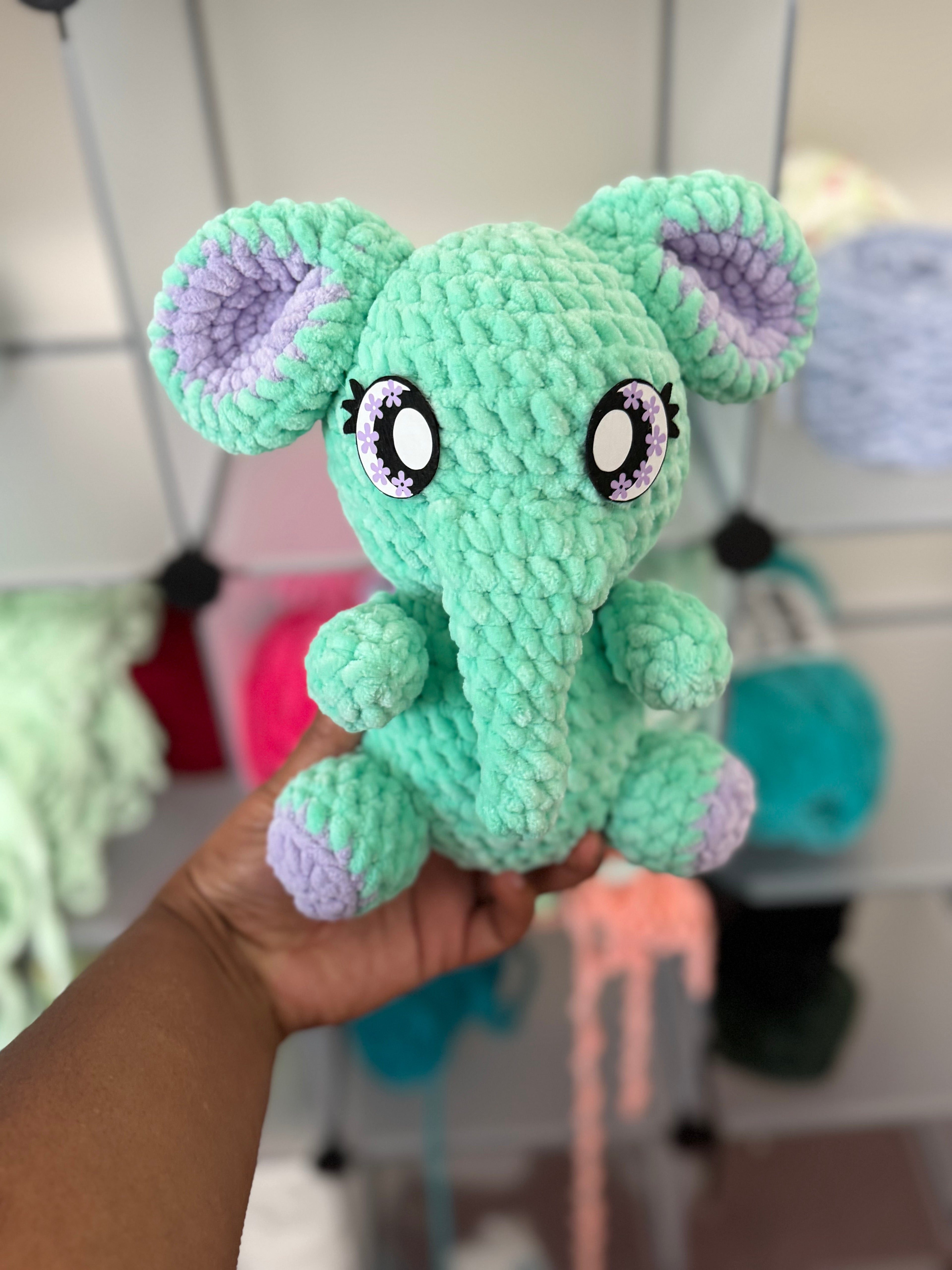 Tiffany and purple sitting elephant