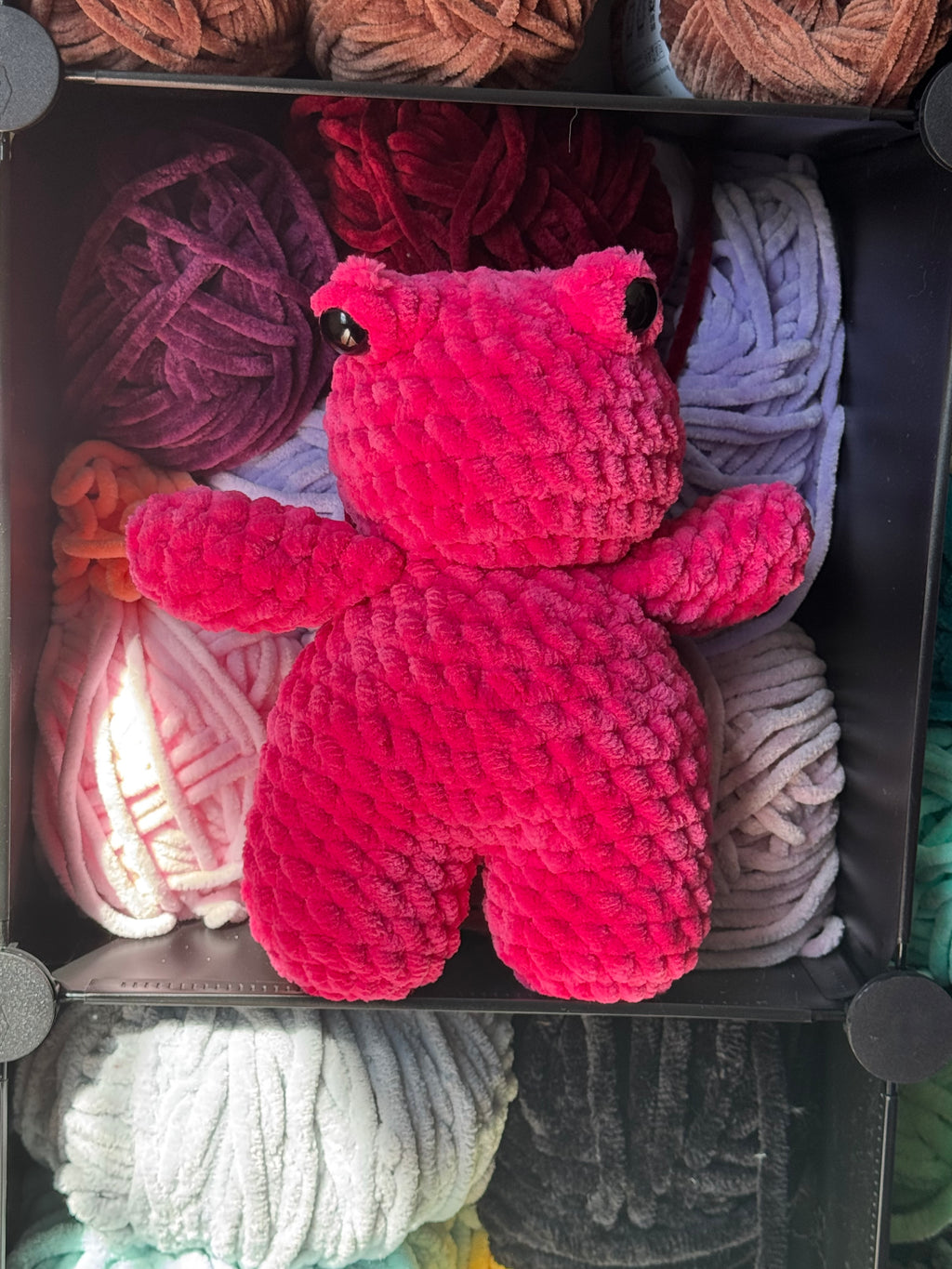 Hand-crocheted pink frog