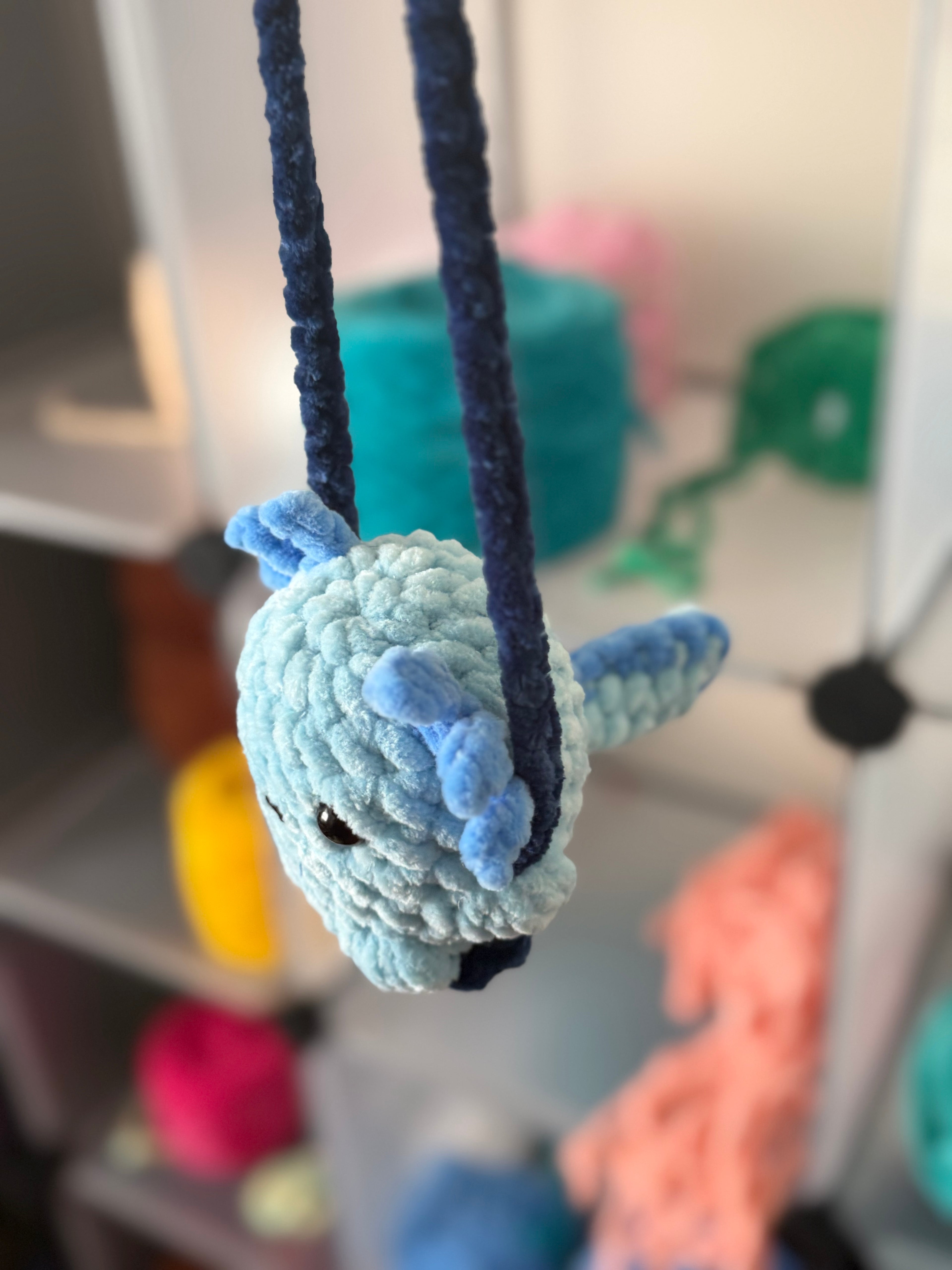 Blue axolotl car swing