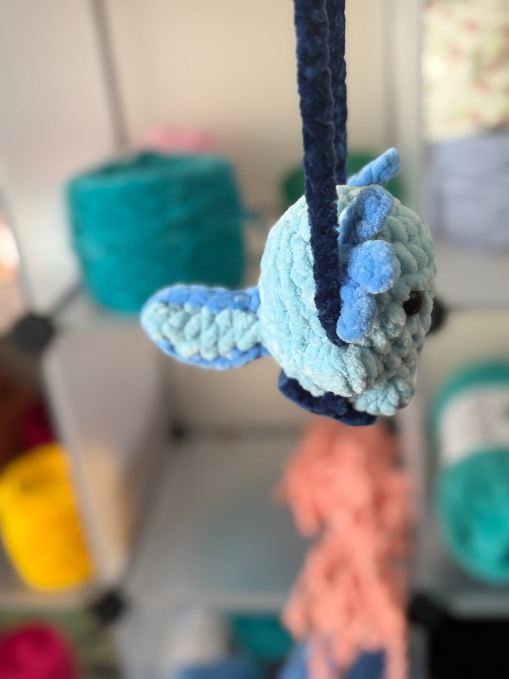 Blue axolotl car swing