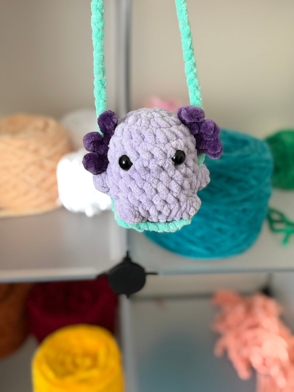 Purple axolotl car swing