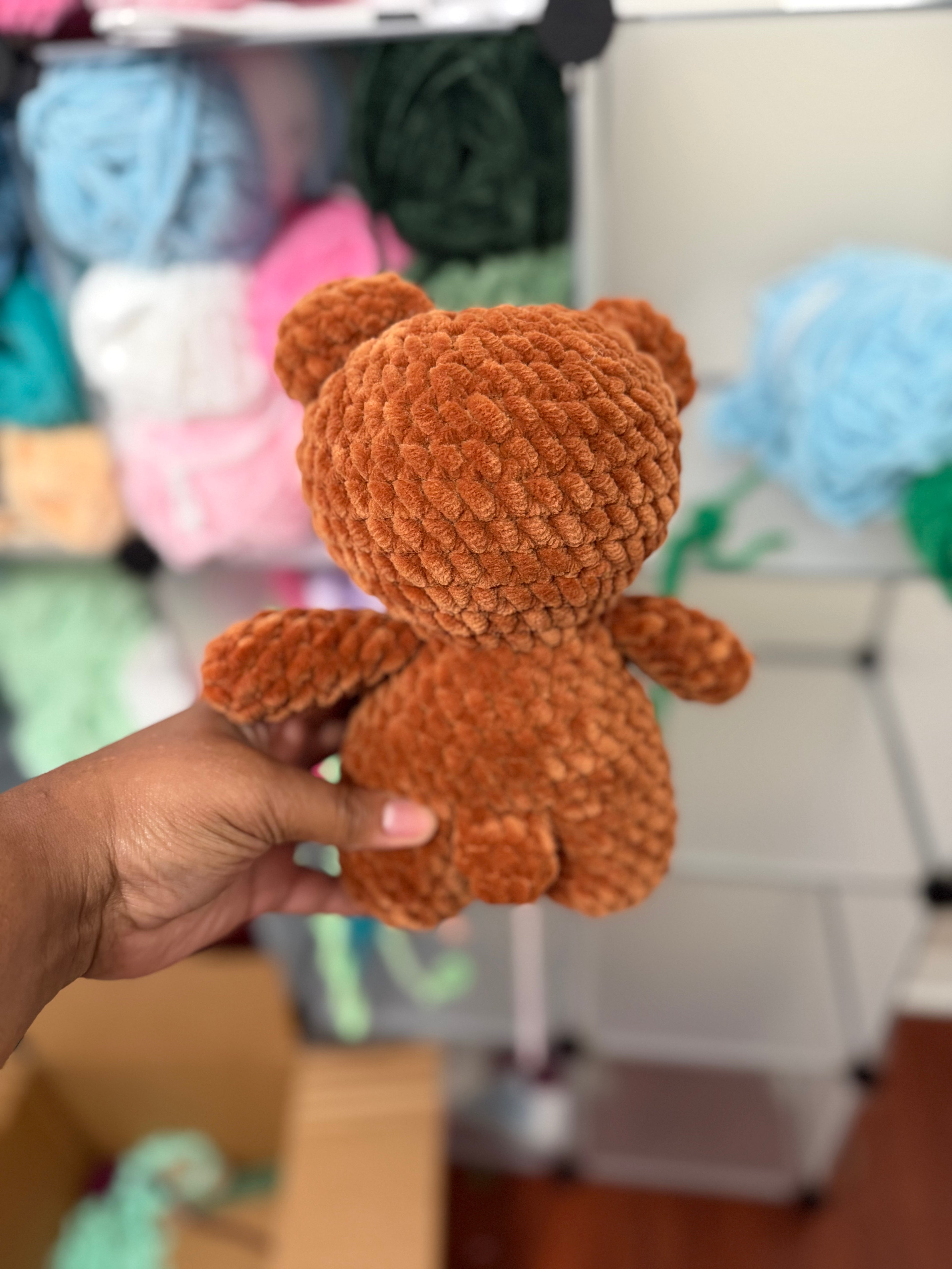 Brown bear with pink