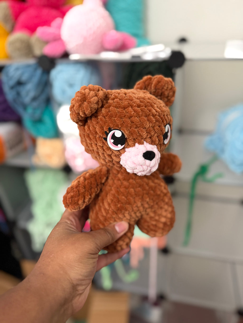 Brown bear with pink