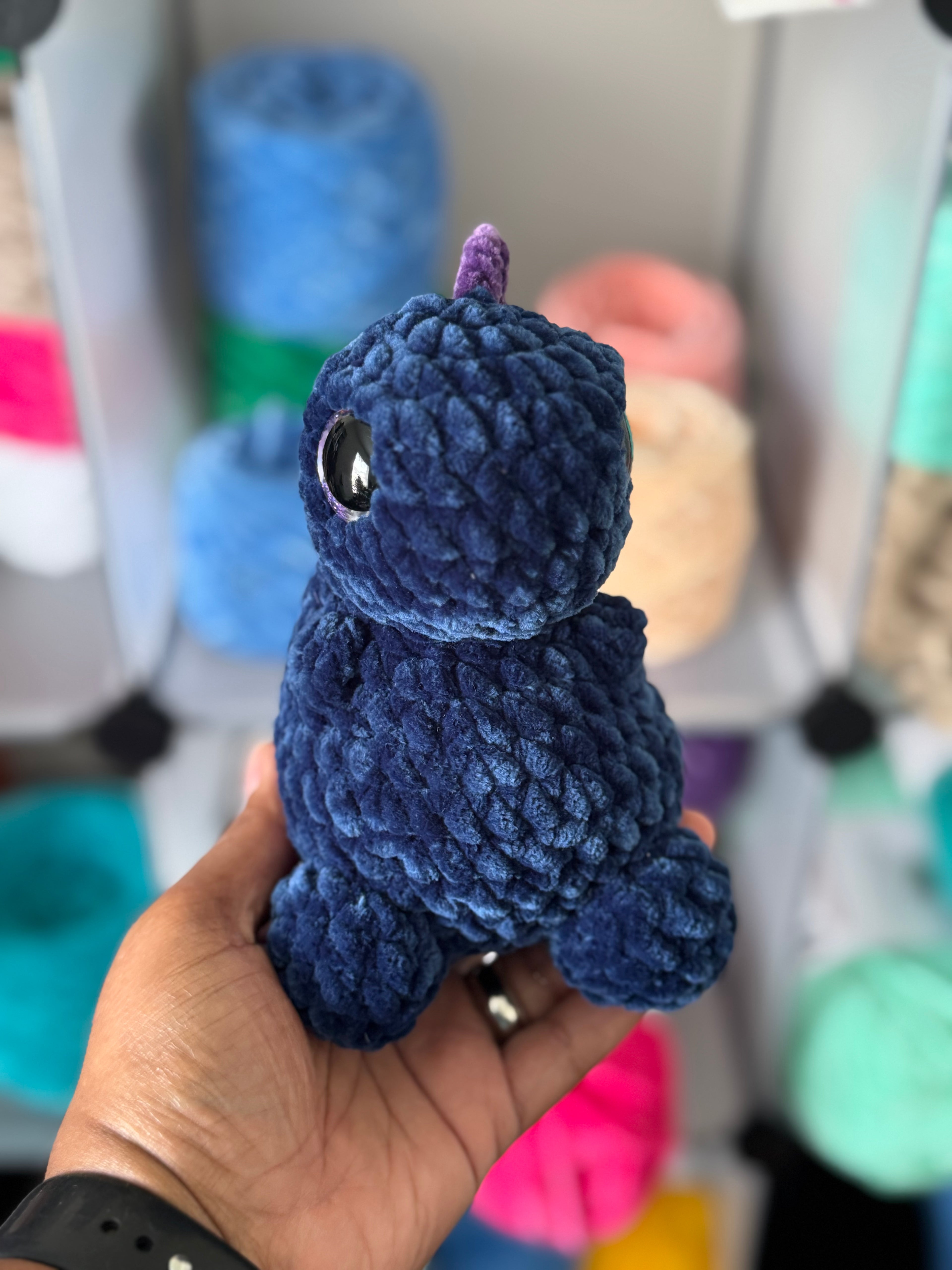 Hand-crocheted chubby Dino
