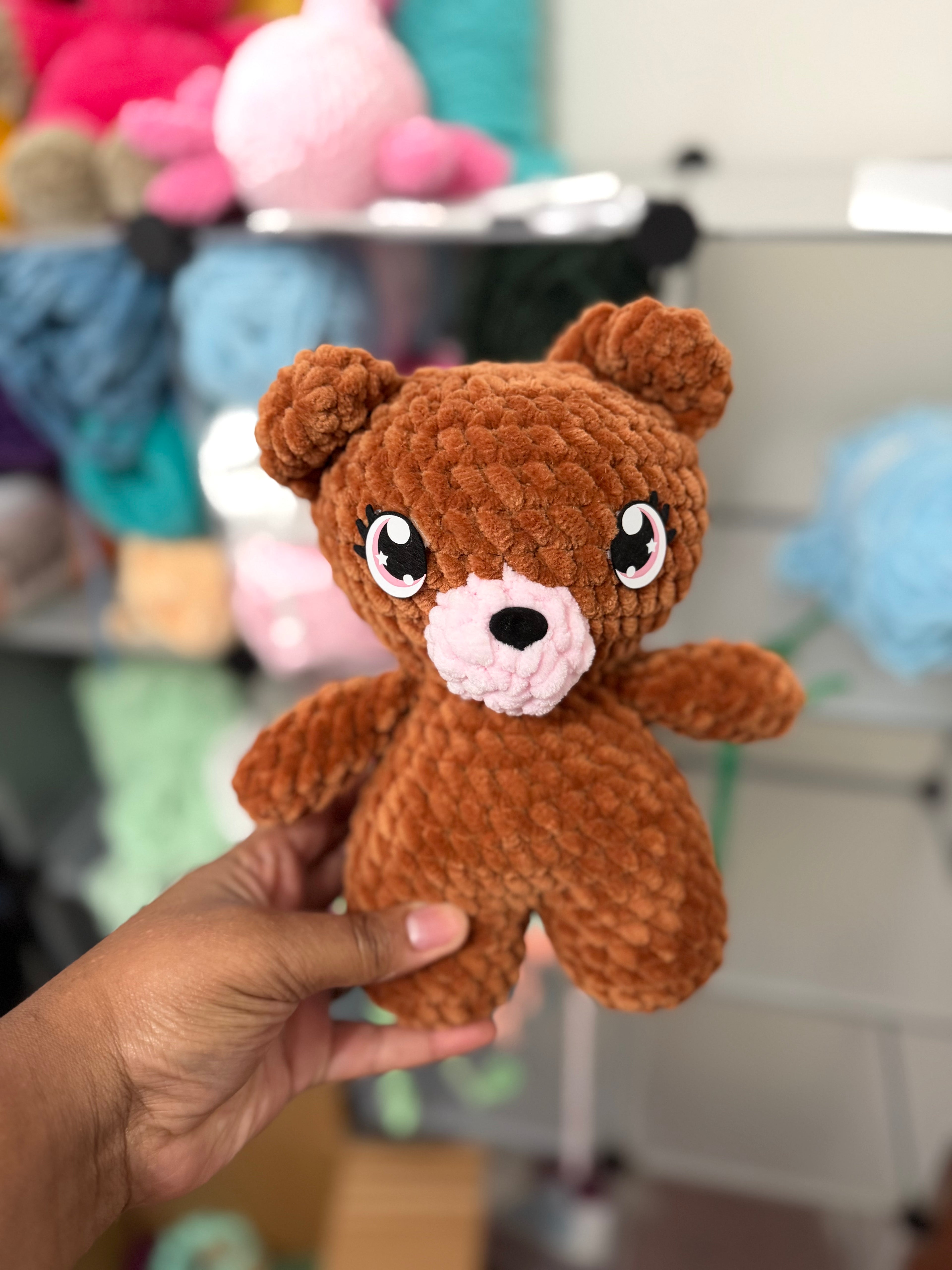 Brown bear with pink
