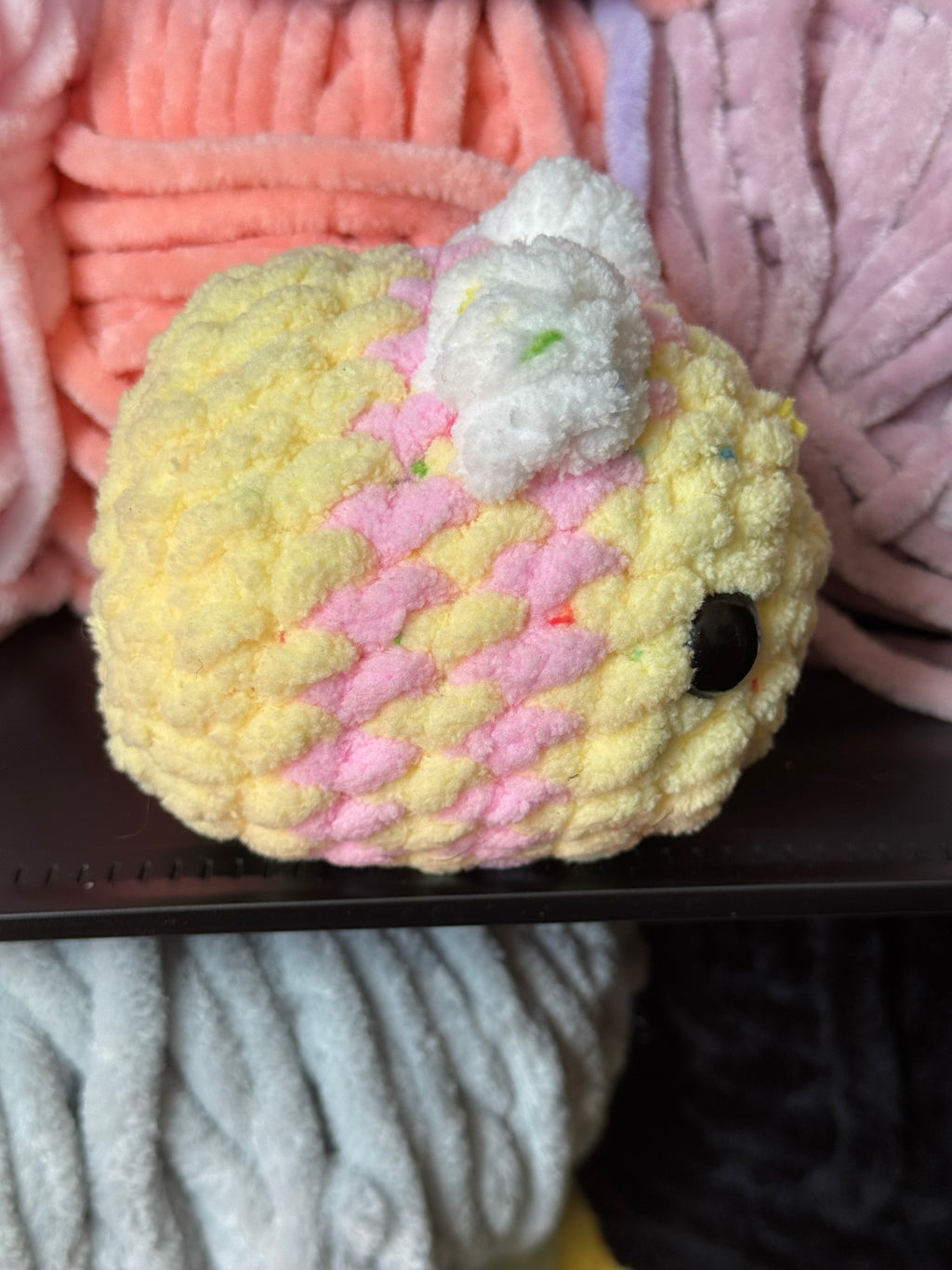 Hand-crocheted confetti bee