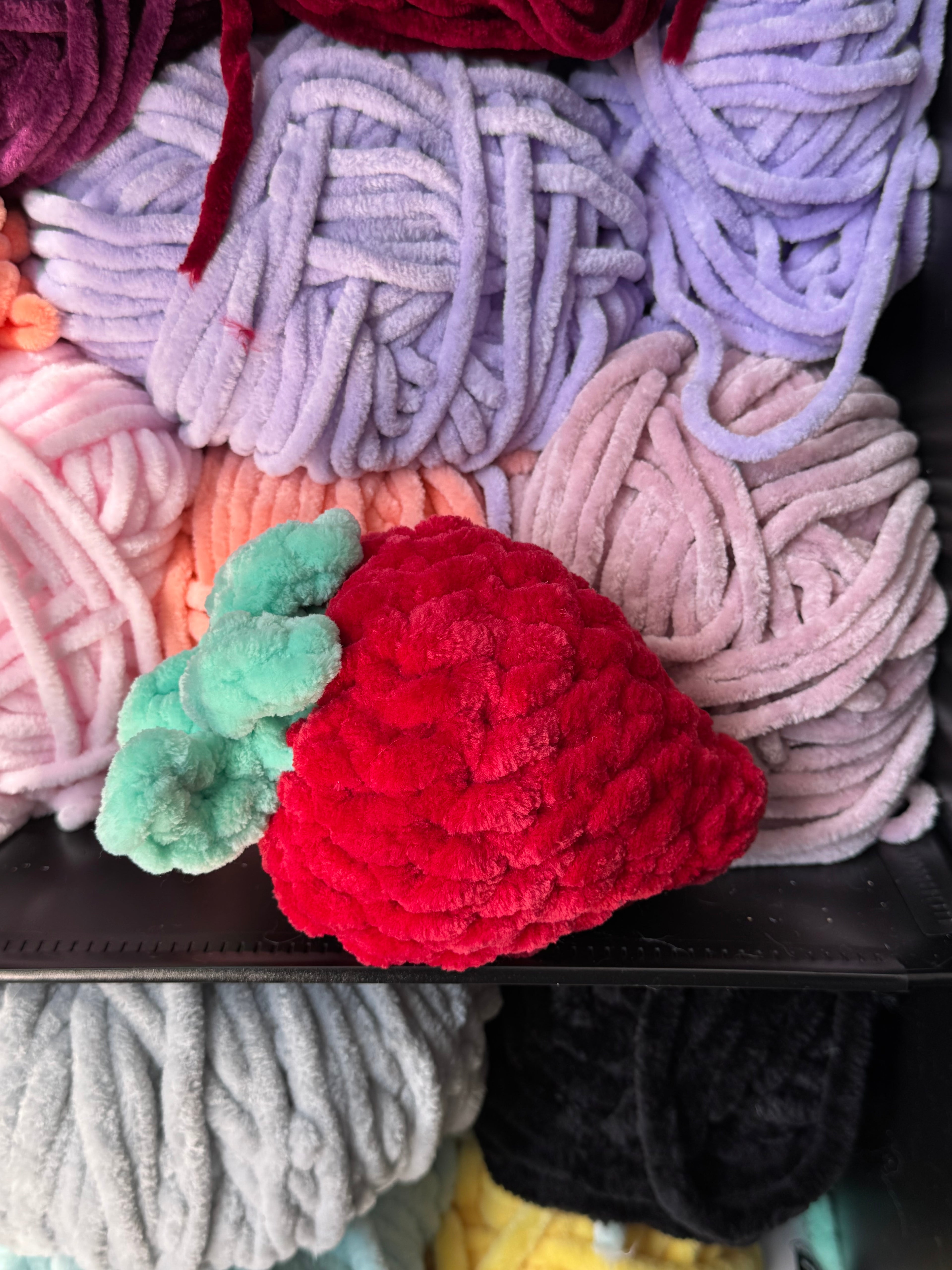 Hand-crocheted red strawberry