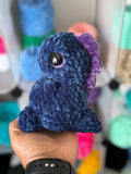 Hand-crocheted chubby Dino