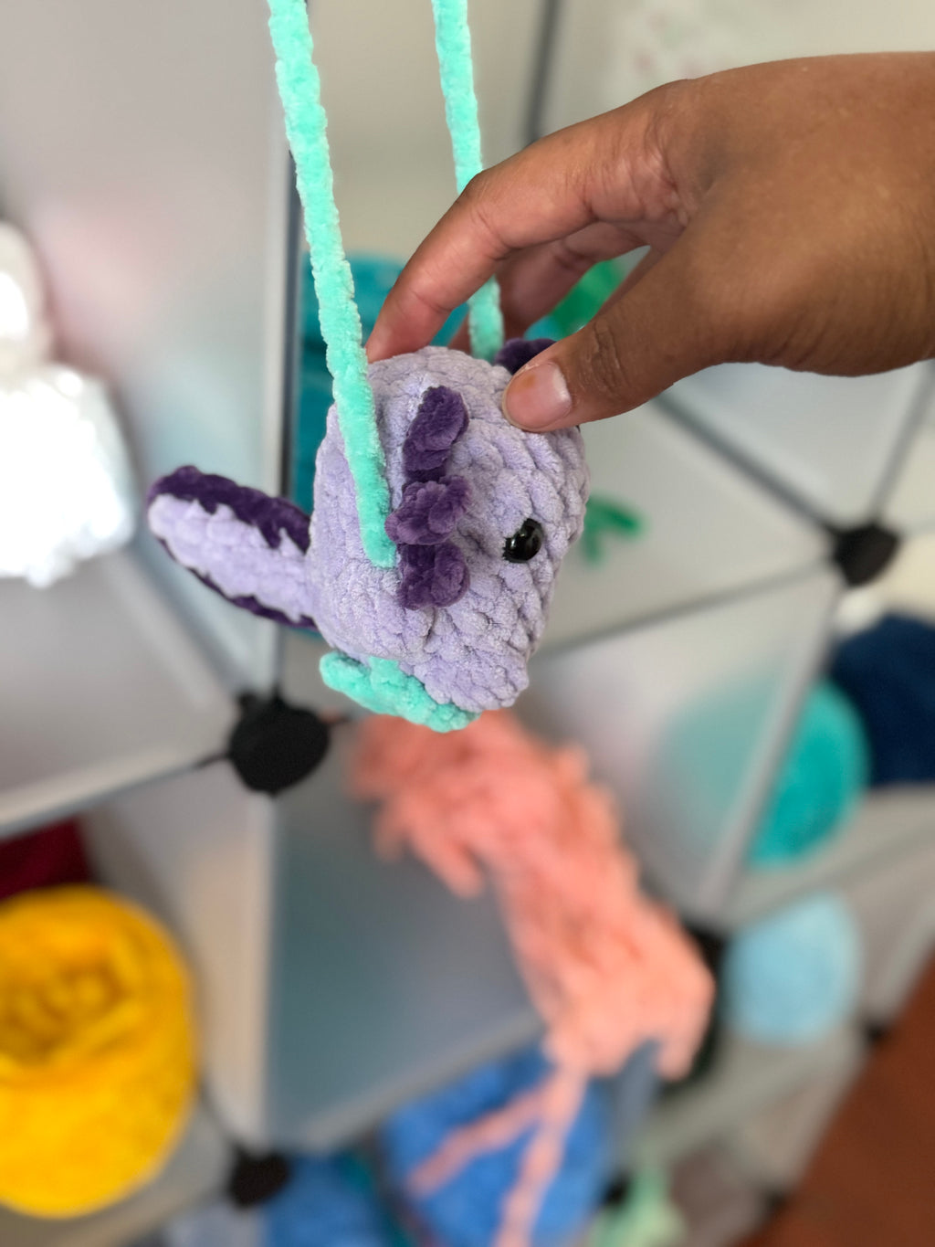 Purple axolotl car swing
