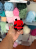 Red and black bee